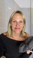 Laura L.